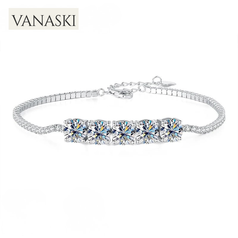 Silver bracelet with three clear gemstones on a white background, featuring the Vanaski brand.