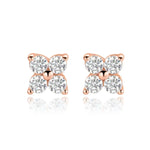 Rose gold butterfly-shaped earrings with clear gemstones on a white background