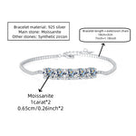 Silver bracelet with moissanite stones on a white background