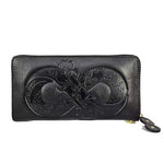Black leather wallet with embossed design on a white background