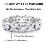 Silver ring with Moissanite stones on a white background