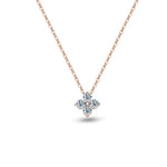 Rose gold necklace with a four-leaf clover pendant on a white background