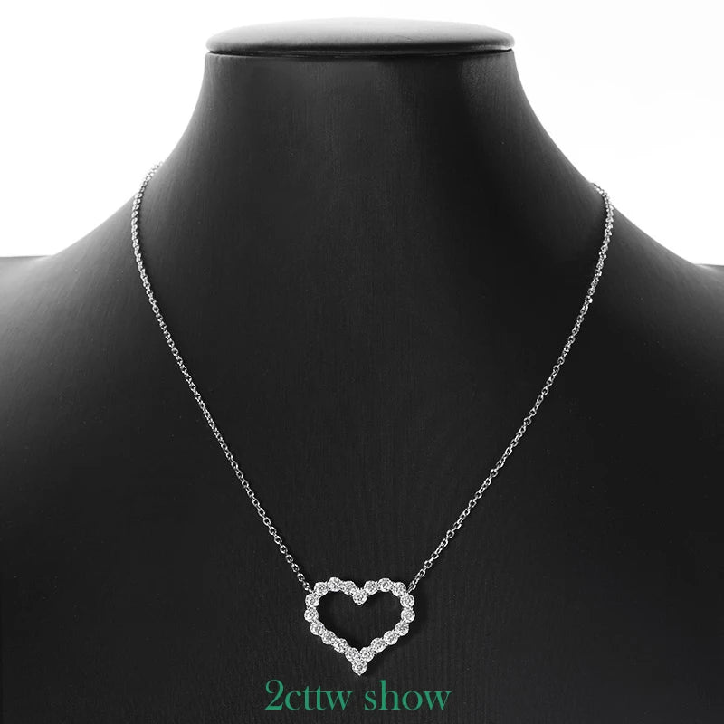 Heart-shaped diamond necklace on a black mannequin with '2cttw show' text.