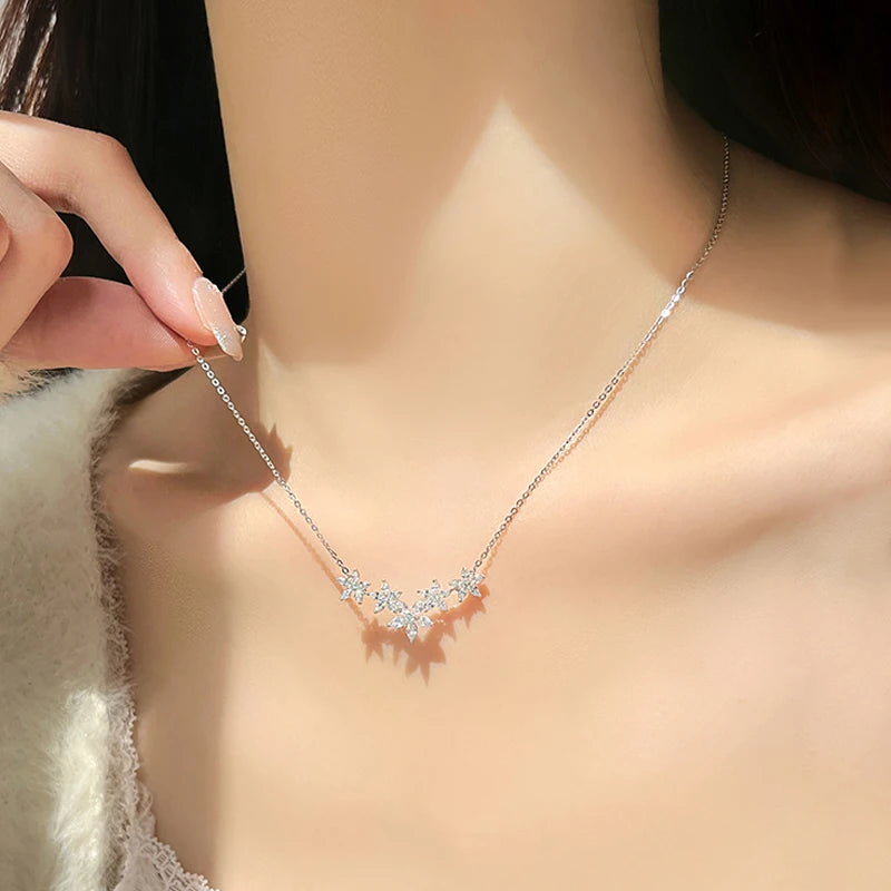 Necklace with a star-shaped pendant being worn on a mannequin