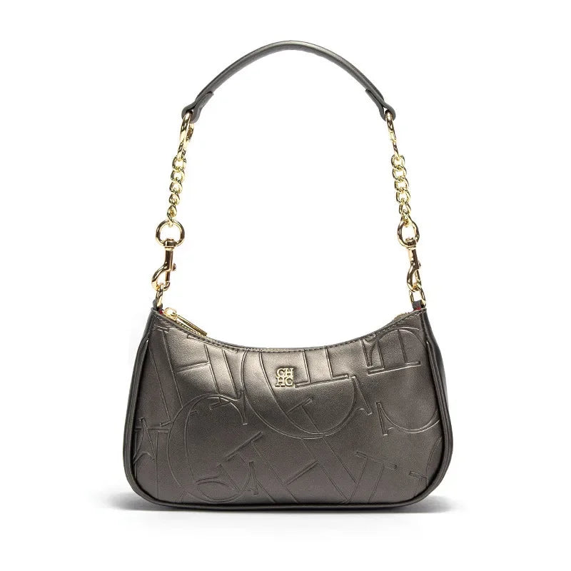 Silver handbag with gold chain strap on a white background