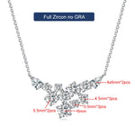 Silver necklace with zirconia stones on a white background