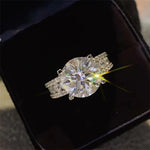 Diamond ring on a black cushion with a close-up view
