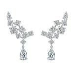 Pair of diamond earrings on a white background