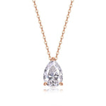 Rose gold necklace with a teardrop-shaped diamond pendant on a white background