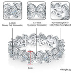 Butterfly-shaped silver ring with marquise and round cut moissanite stones, featuring detailed specifications.