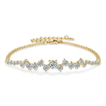 Gold bracelet with diamond-like stones on a white background