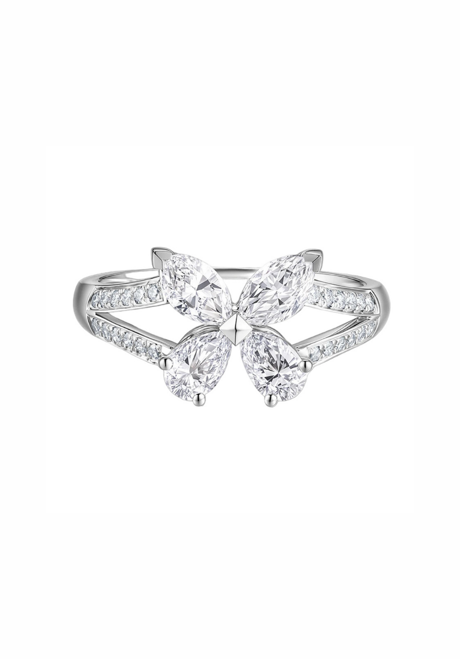 Diamond ring with a butterfly design on a white background