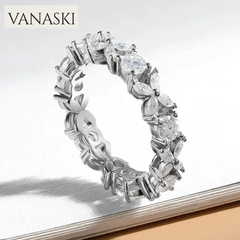 Silver ring with diamonds on a white background, featuring the Vanaski brand.
