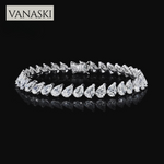 Diamond bracelet with pear-shaped stones on a black background, featuring the Vanaski brand.