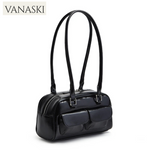 Black handbag with VANASKI branding on a white background