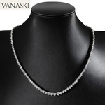 Silver necklace on a black mannequin with 'VANASKI' branding.