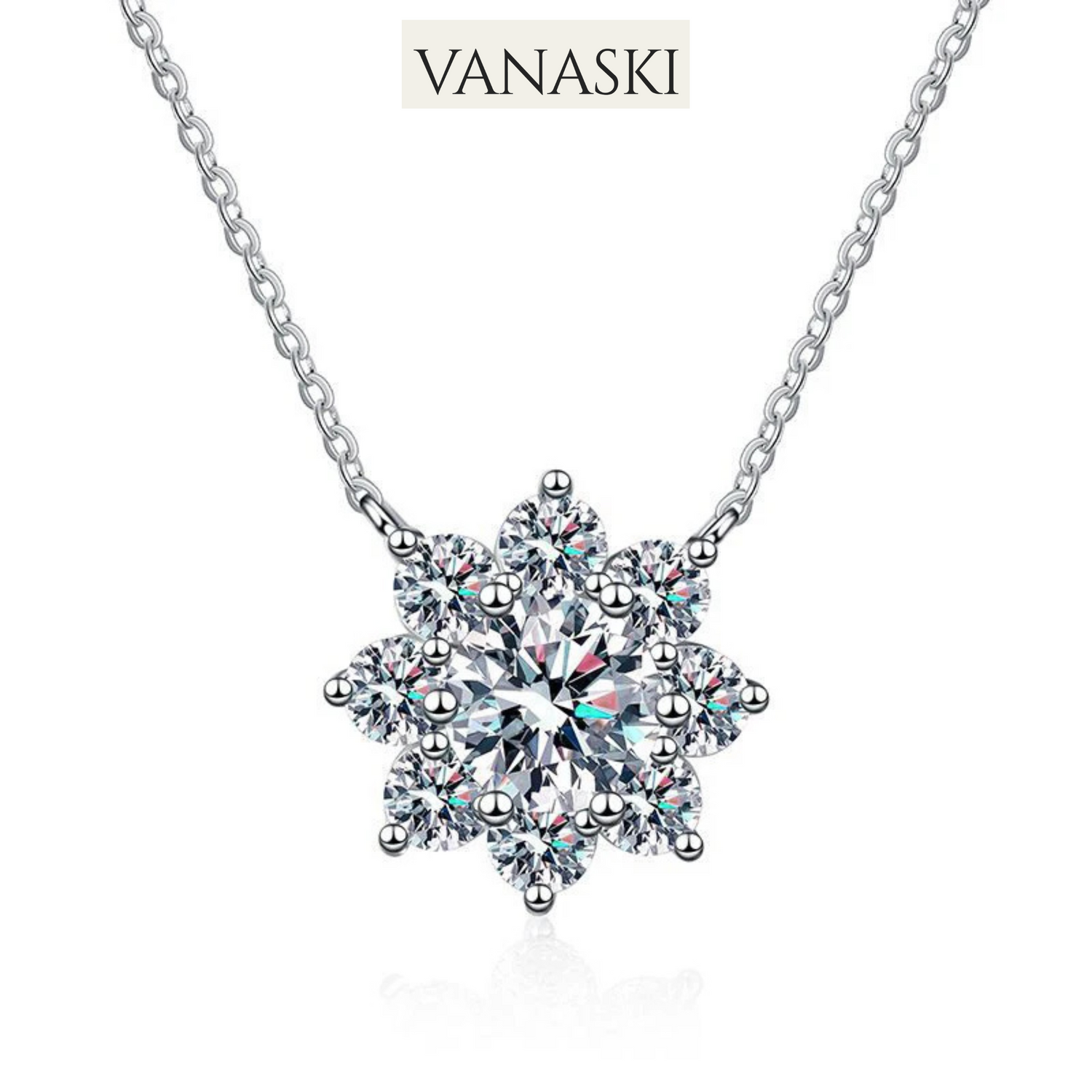 Snowflake-shaped pendant necklace with Vanaski branding on a white background