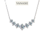 Silver necklace with clear stones on a white background, featuring the Vanaski brand.