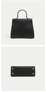 Black handbag and wallet set on a white background