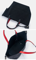 Black handbag with red accents on a white background
