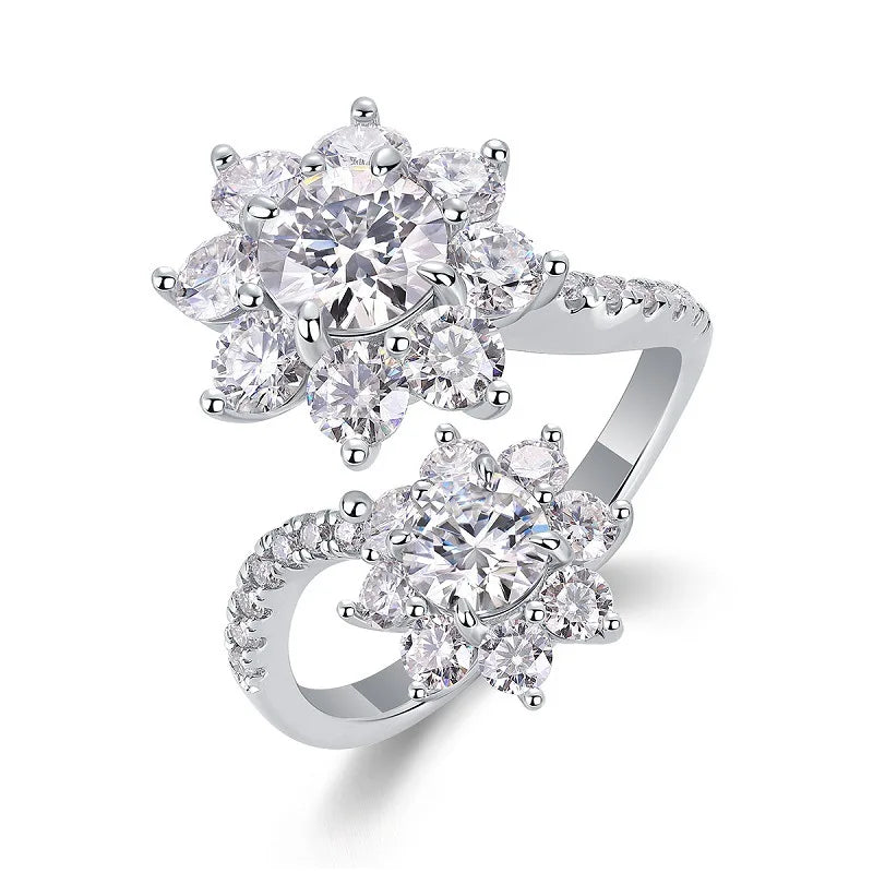Silver ring with multiple gemstones on a white background