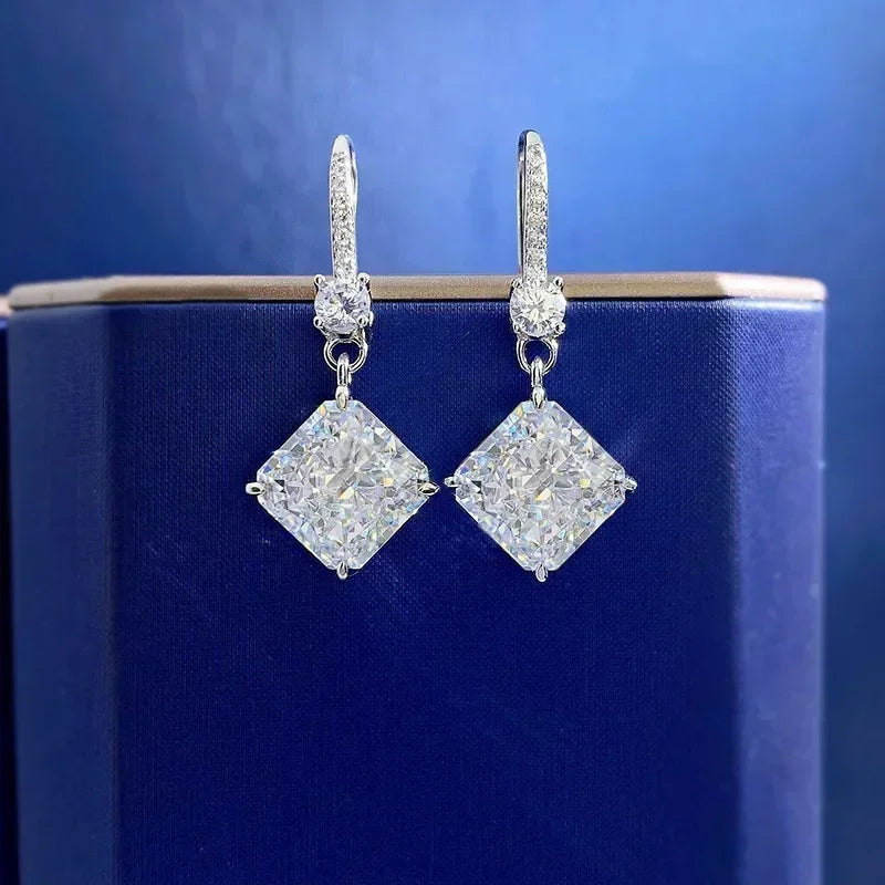 Diamond earrings on a blue background
