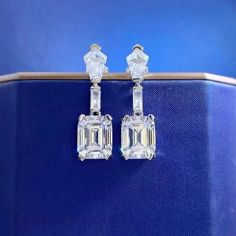 Diamond earrings on a blue background