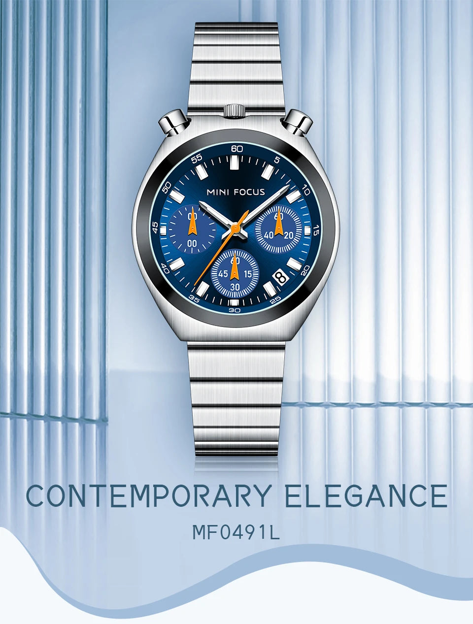 Silver watch with blue face on a light blue background, featuring the brand 'Mini Focus'.