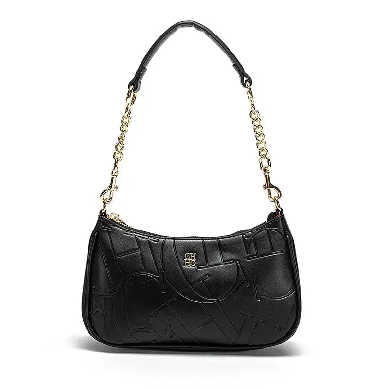 Black handbag with chain strap on a white background