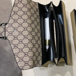 Patterned case with pens inside on a textured surface