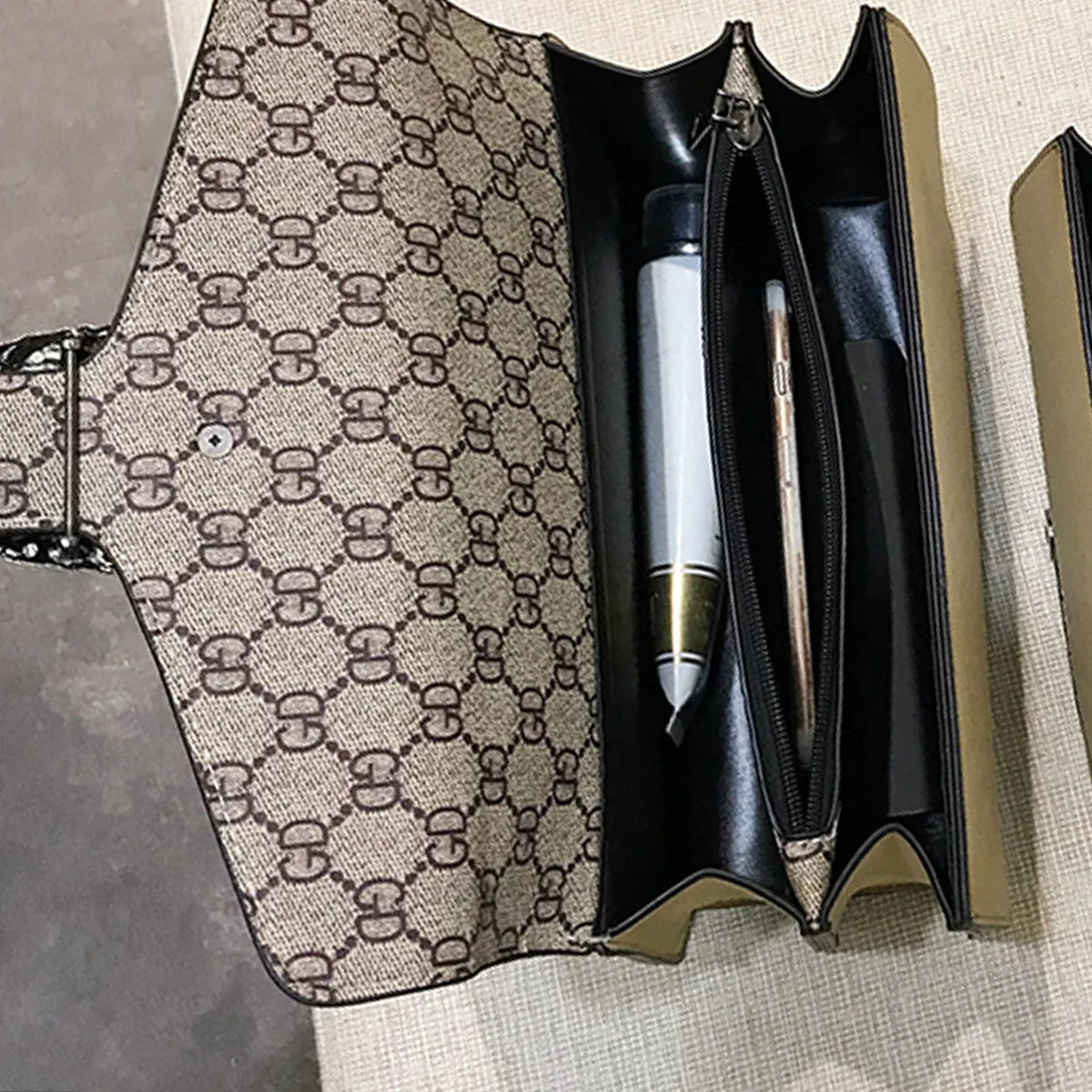 Patterned case with pens inside on a textured surface