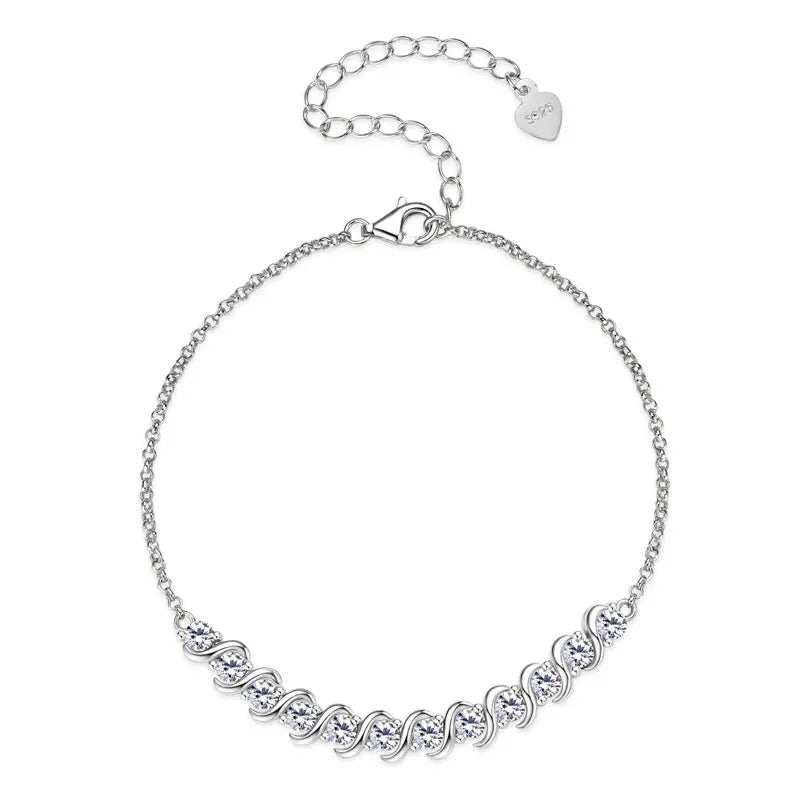 Silver bracelet with clear stones on a white background