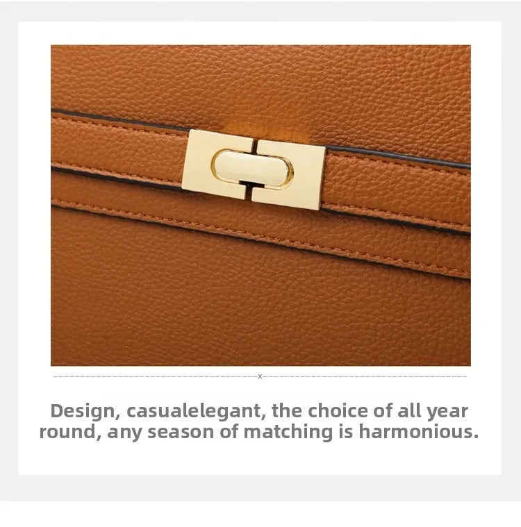 Brown leather handbag with gold clasp on a white background