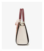 Handbag with a floral pattern on a white background
