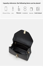 Black handbag with capacity reference items displayed above it on a white background