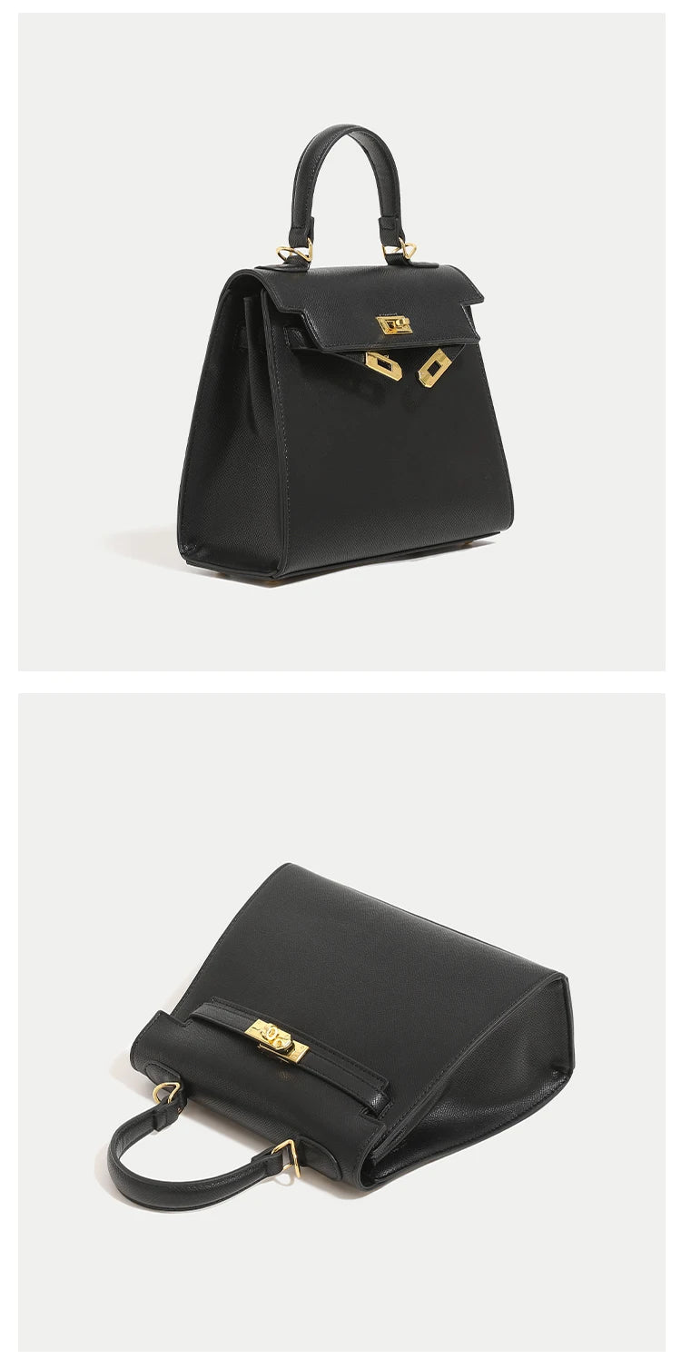 Black handbag with gold accents on a white background