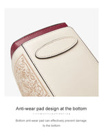 White and red leather product with anti-wear pad design on a white background