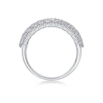 Silver ring with diamond accents on a white background
