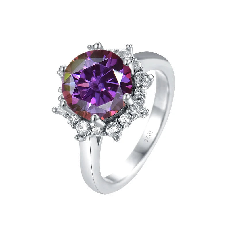 Silver ring with a large purple gemstone on a white background