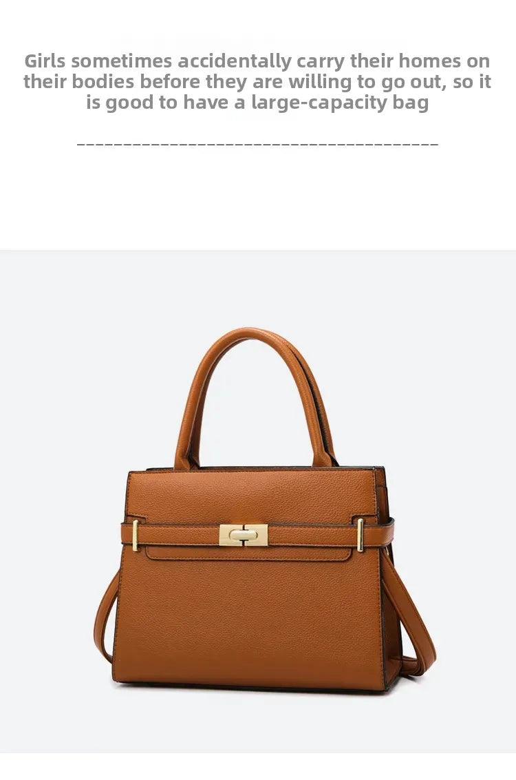 Brown handbag with gold accents on a white background