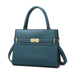 Teal handbag with a gold clasp on a white background