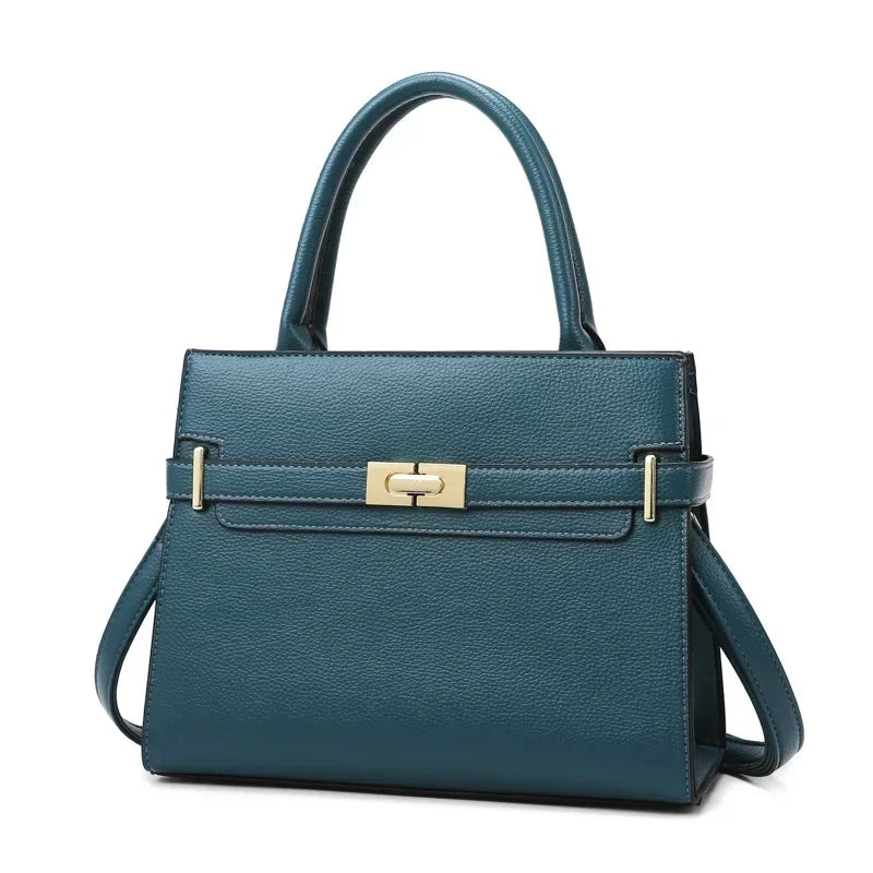 Teal handbag with a gold clasp on a white background