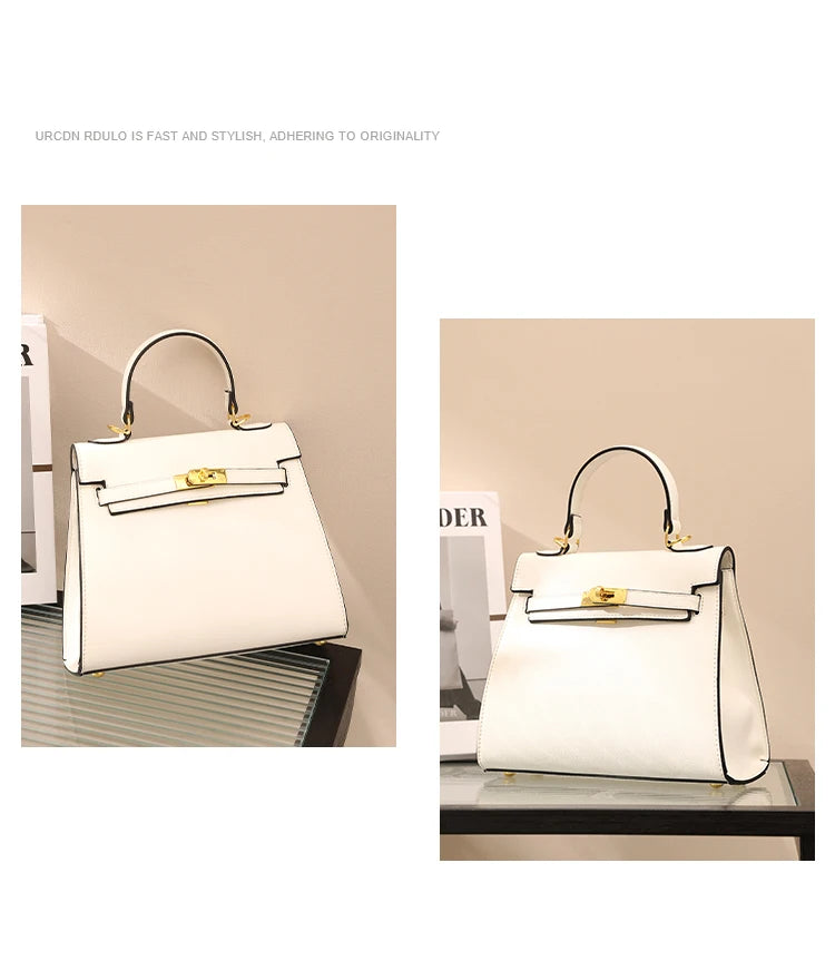 White handbag with gold hardware on a neutral background