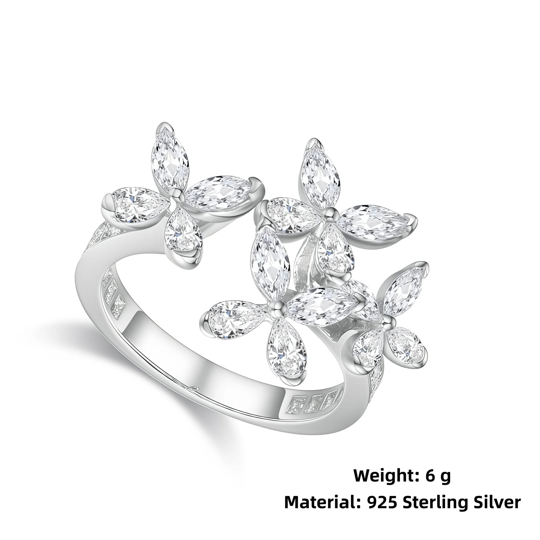 Silver ring with floral design and '925 Sterling Silver' marking on a white background