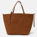 Brown textured tote bag with a visible brand logo on a white background