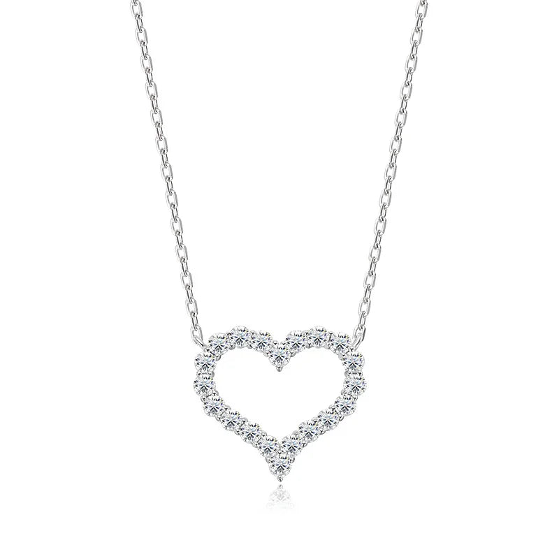Heart-shaped diamond necklace on a white background