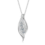 Silver necklace with a leaf-shaped pendant on a white background