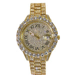 Gold wristwatch with diamond accents on a white cushion, brand 'Miss fox' visible.