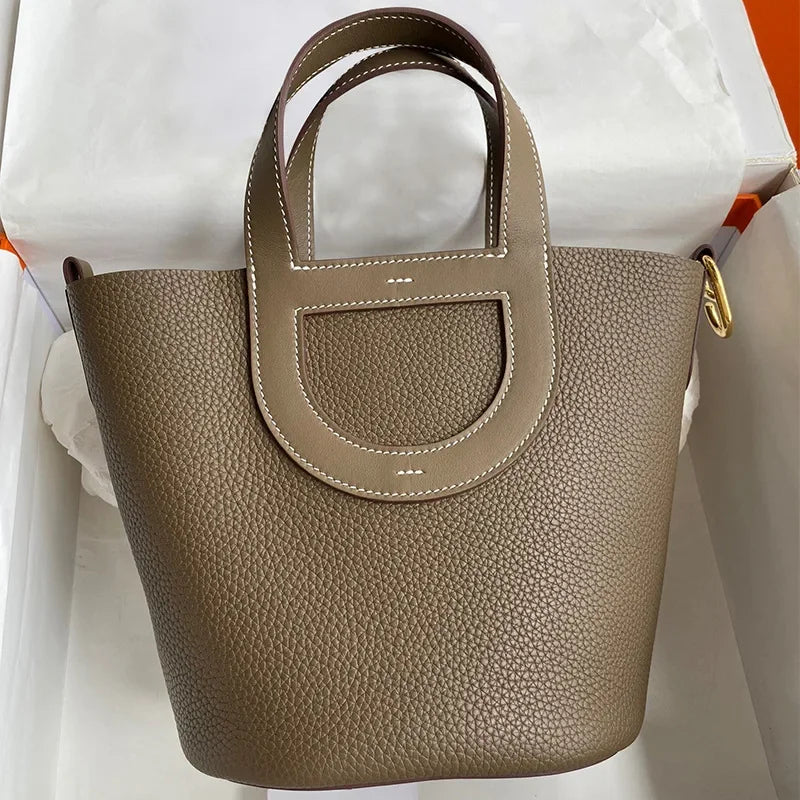 Hot Sale Of The Season New Handmade Wax Thread Pig Nose Bucket Bag Women's Fashionable Versatile Handbag TC Leather Handle Bag f