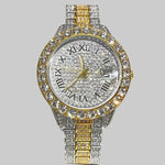 Luxury watch with diamond-studded case and gold band on a white cushion, brand 'Miss fox' visible.